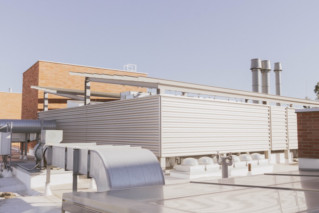 rooftop HVAC unit with visible ice buildup on coils rooftop HVAC unit with visible ice buildup on coils