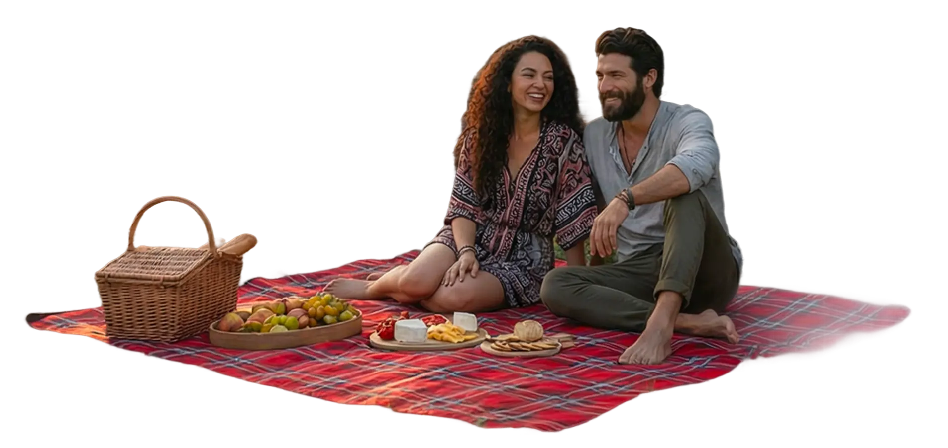 Zwei Personen sitzend bei einem Picknick