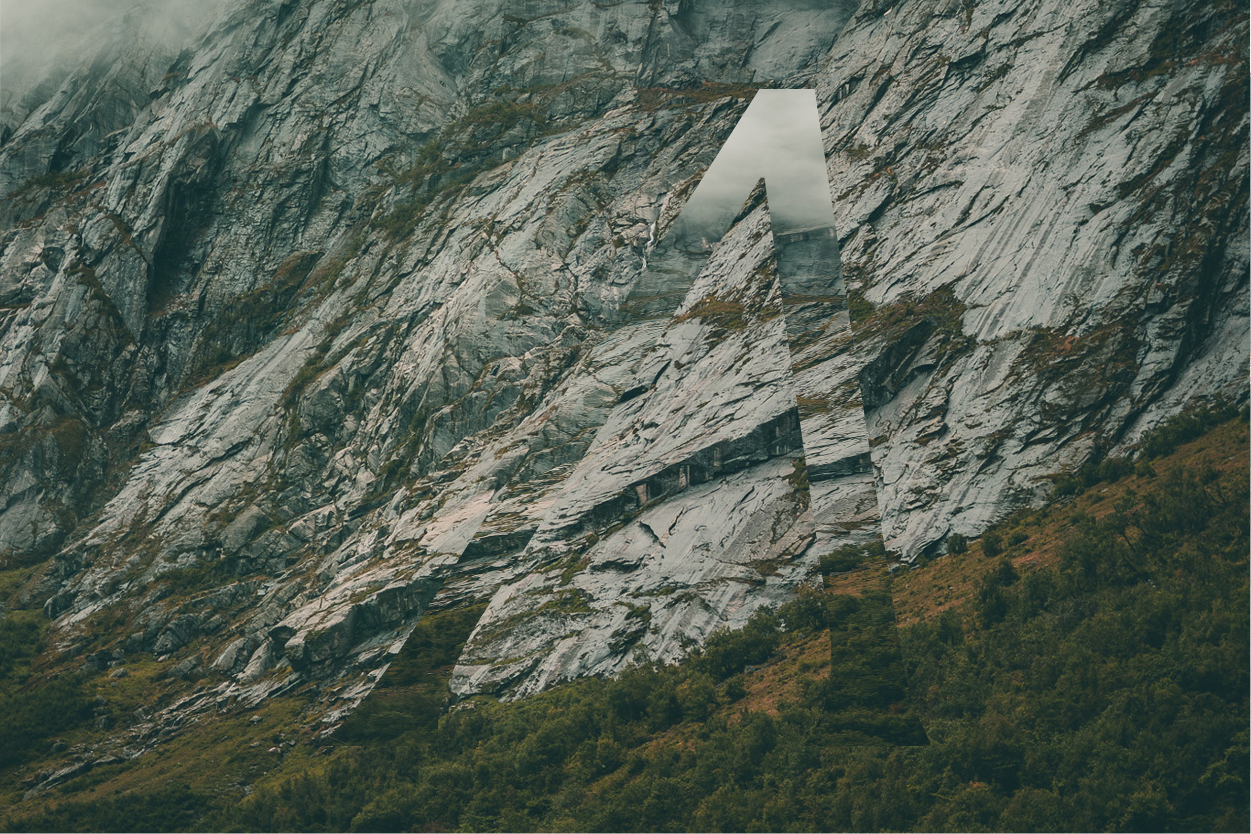 Rocky mountain slope with a large transparent stylized letter A overlay blending into the landscape.