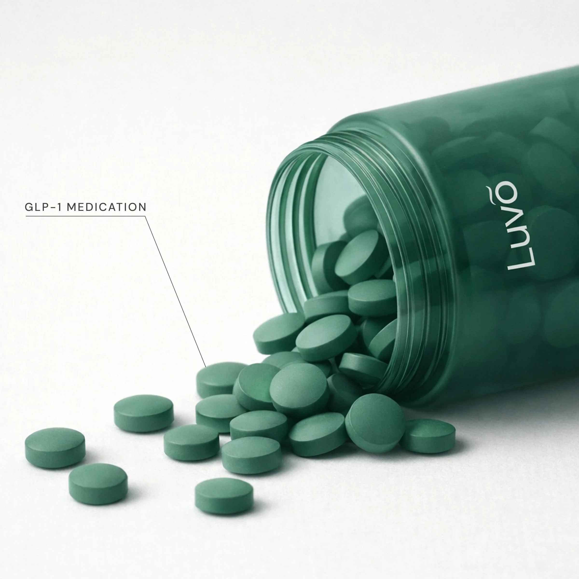 Semaglutide tablets spilled beside a green bottle