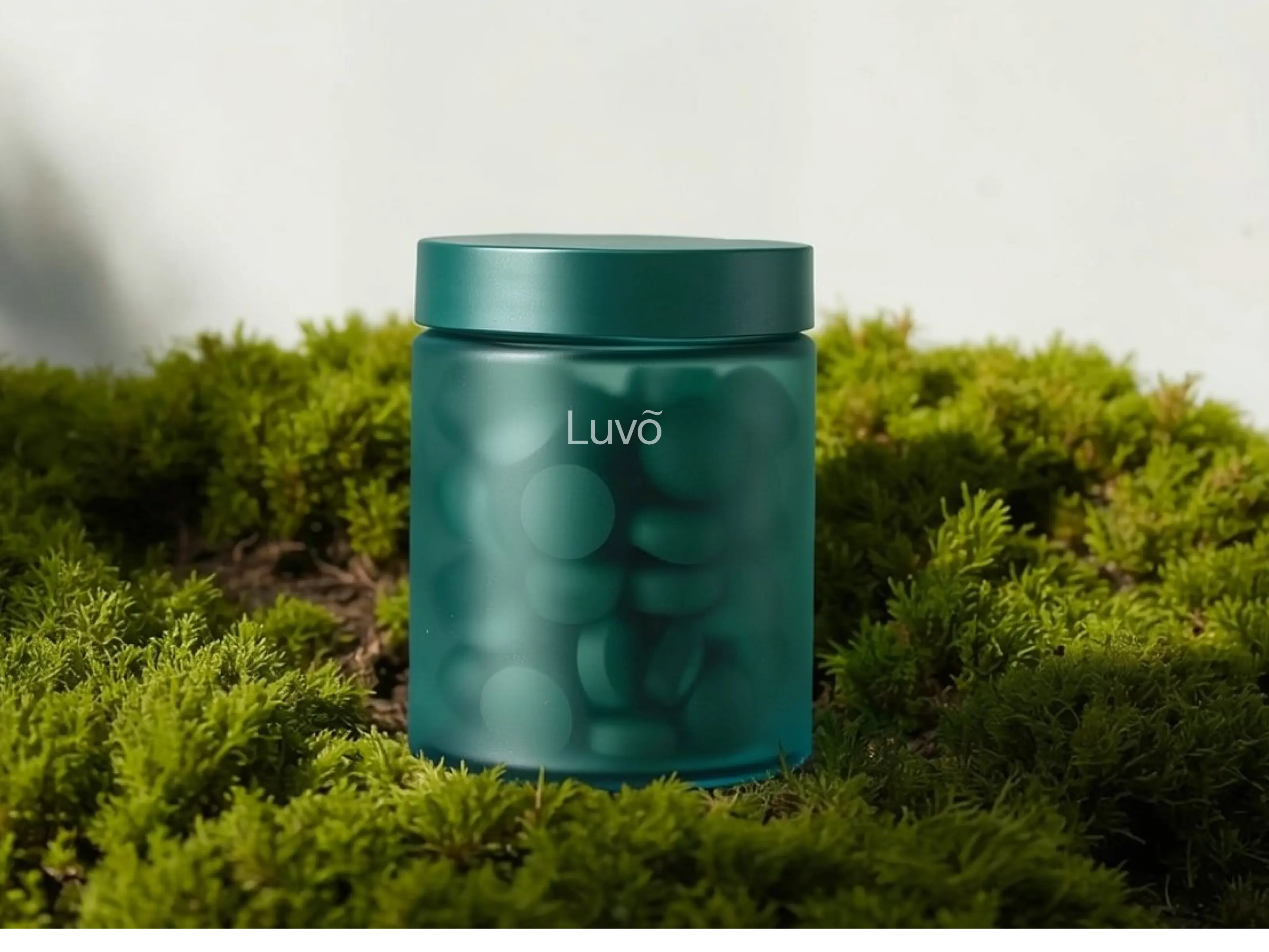 Bottle of microdosing tirzepatide tablets on moss