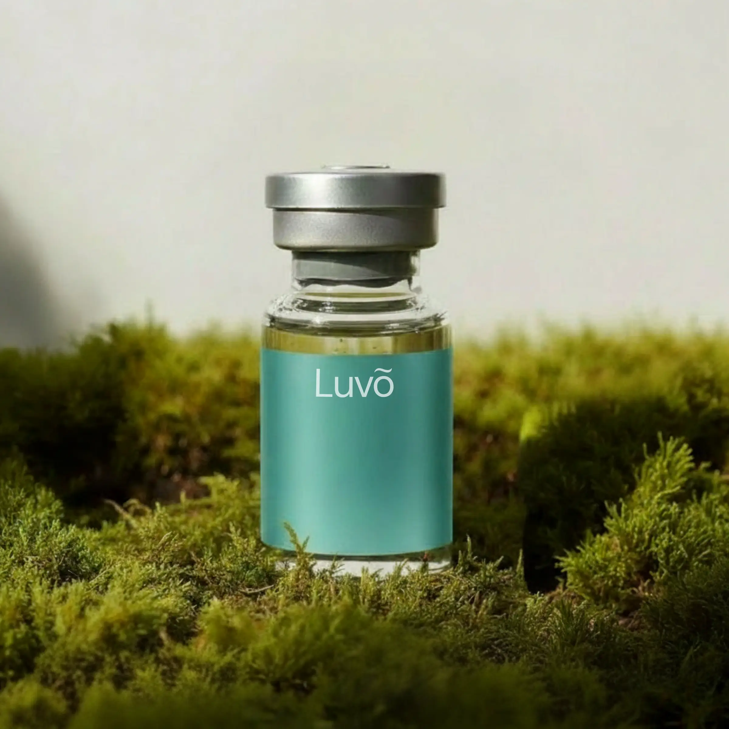 NAD+ injection vial on moss