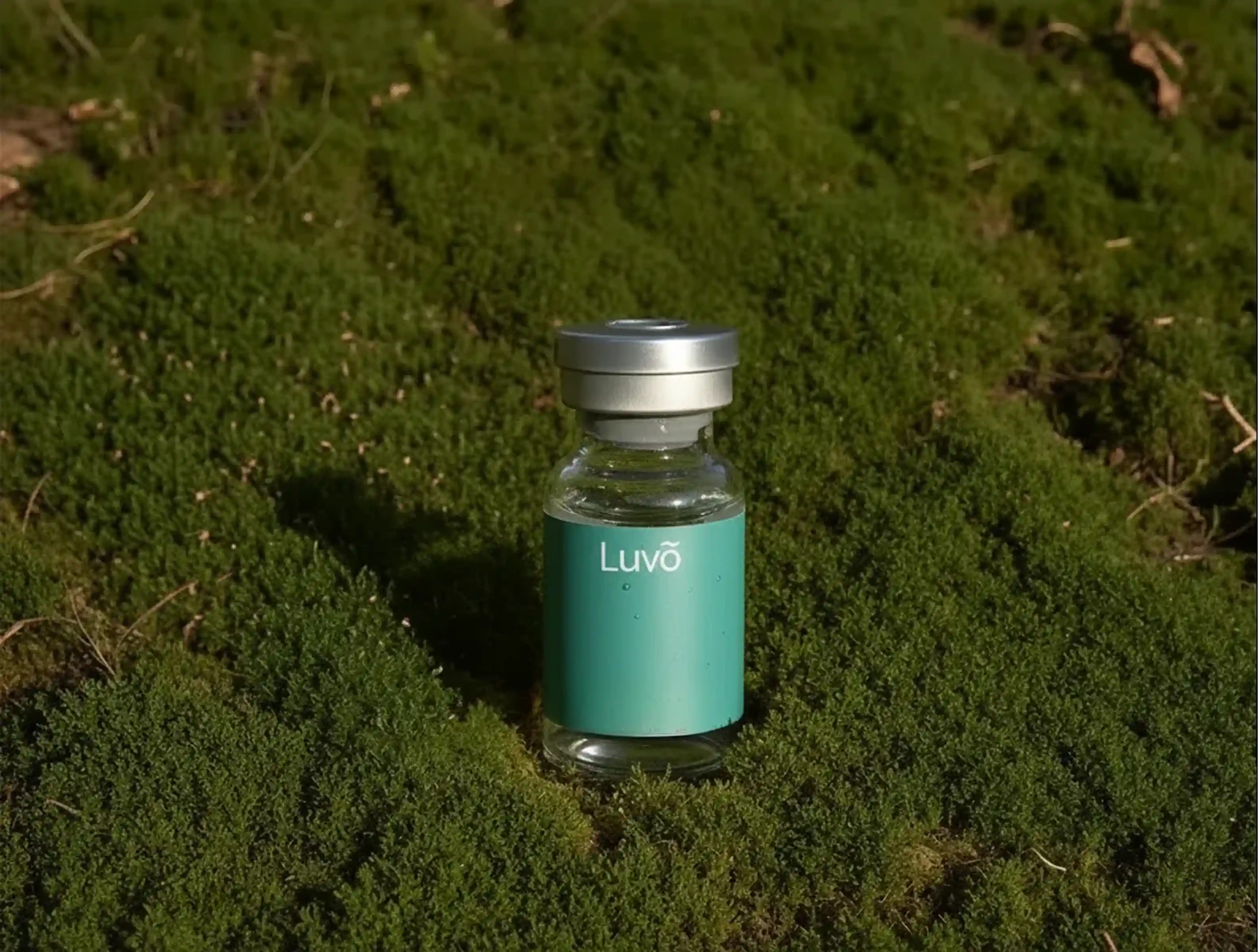 NAD+ injection vial on moss