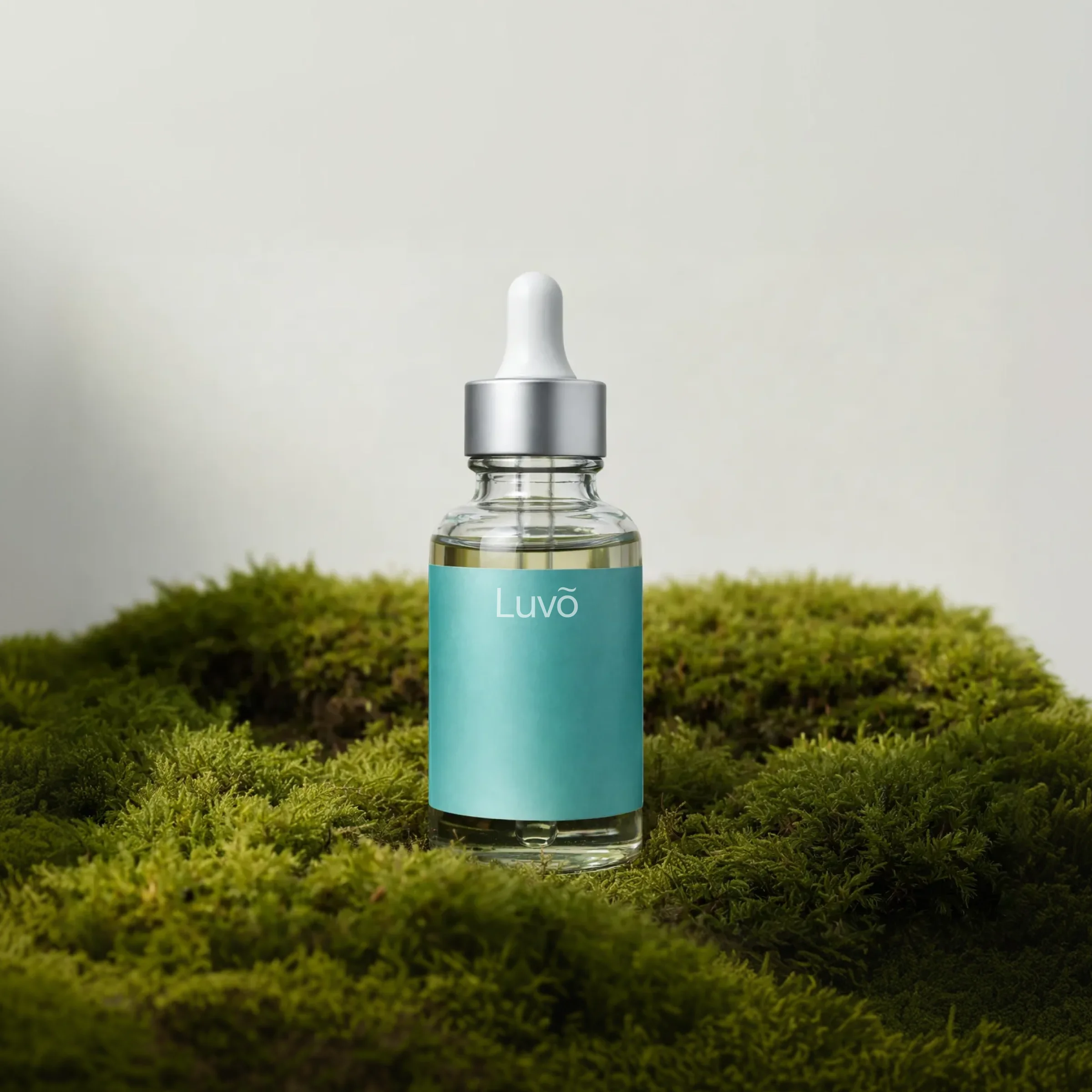 NAD+ drops bottle on moss