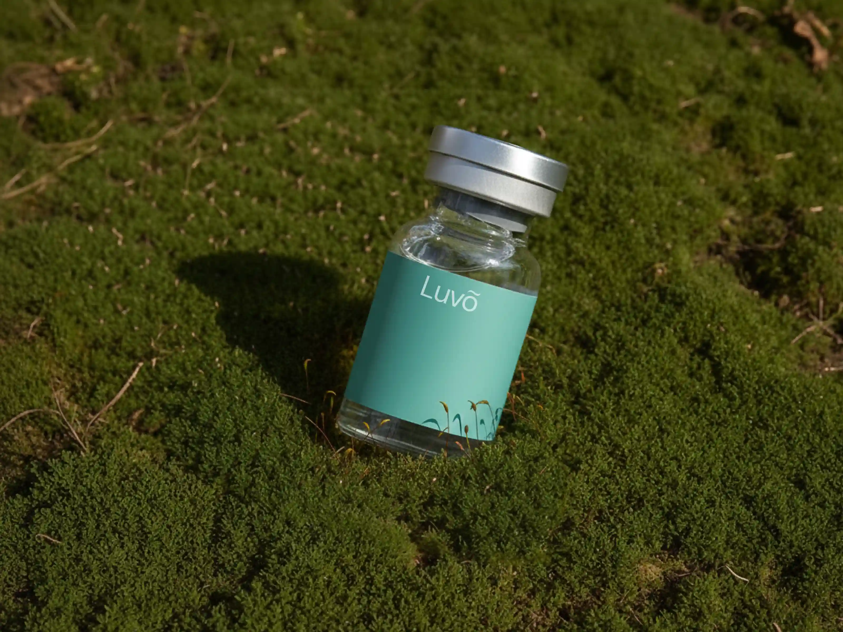 Vitamin B12/MIC injection vial on grass