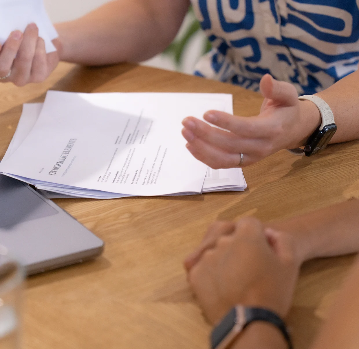 Brand strategist reviewing plans during a strategy session in Cairns