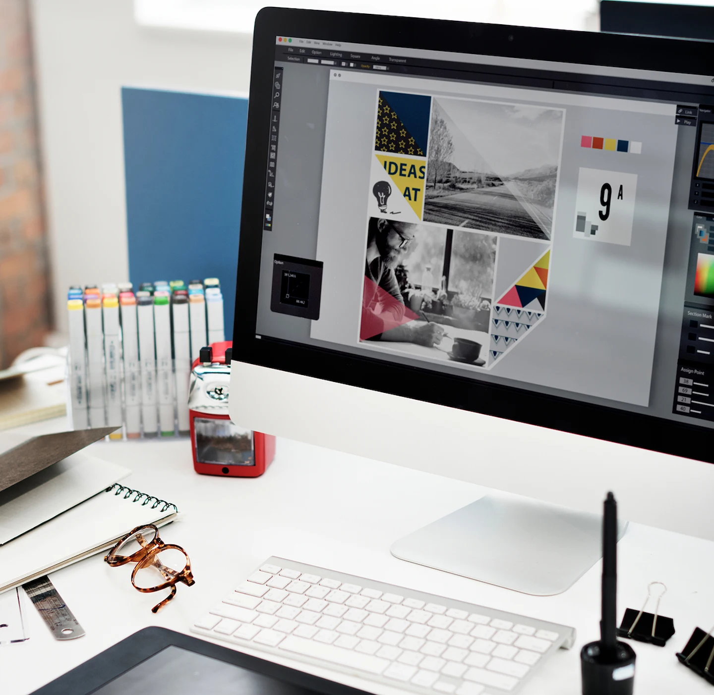 Designer creating brand assets for a website project in Cairns