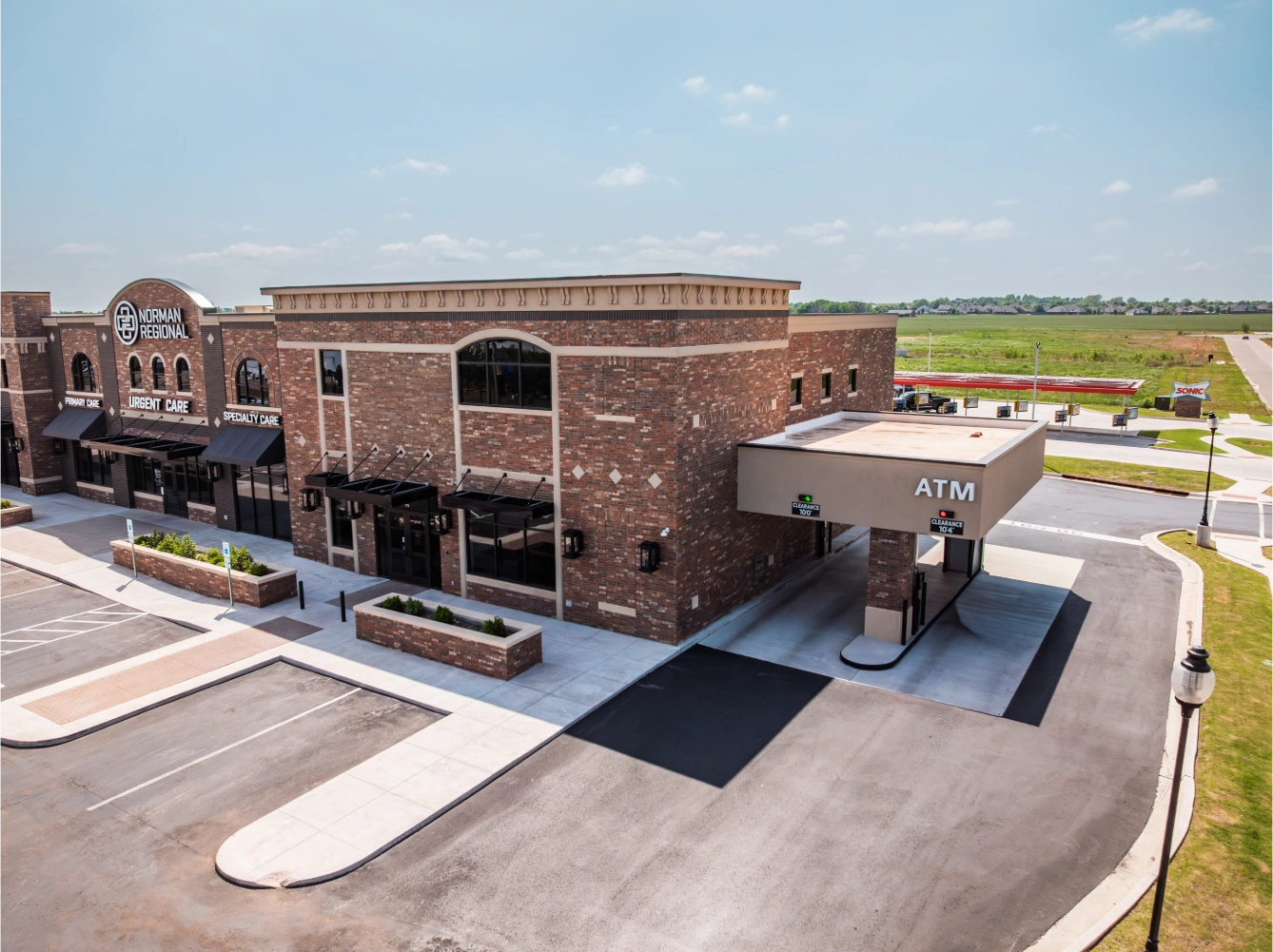 Aerial view of the Brooks Bank Goldsby branch and its drive-up ATM canopy