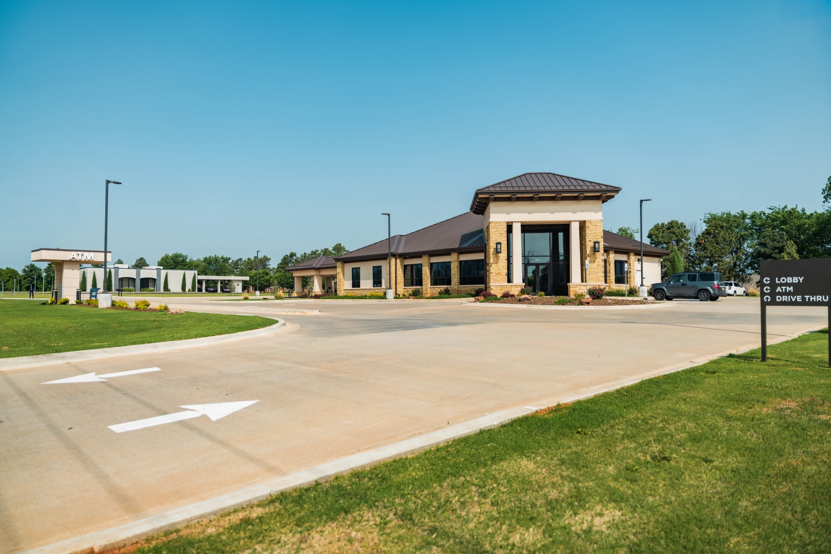 The Brooks Bank Tuttle branch with its drive-thru and ATM lane signage