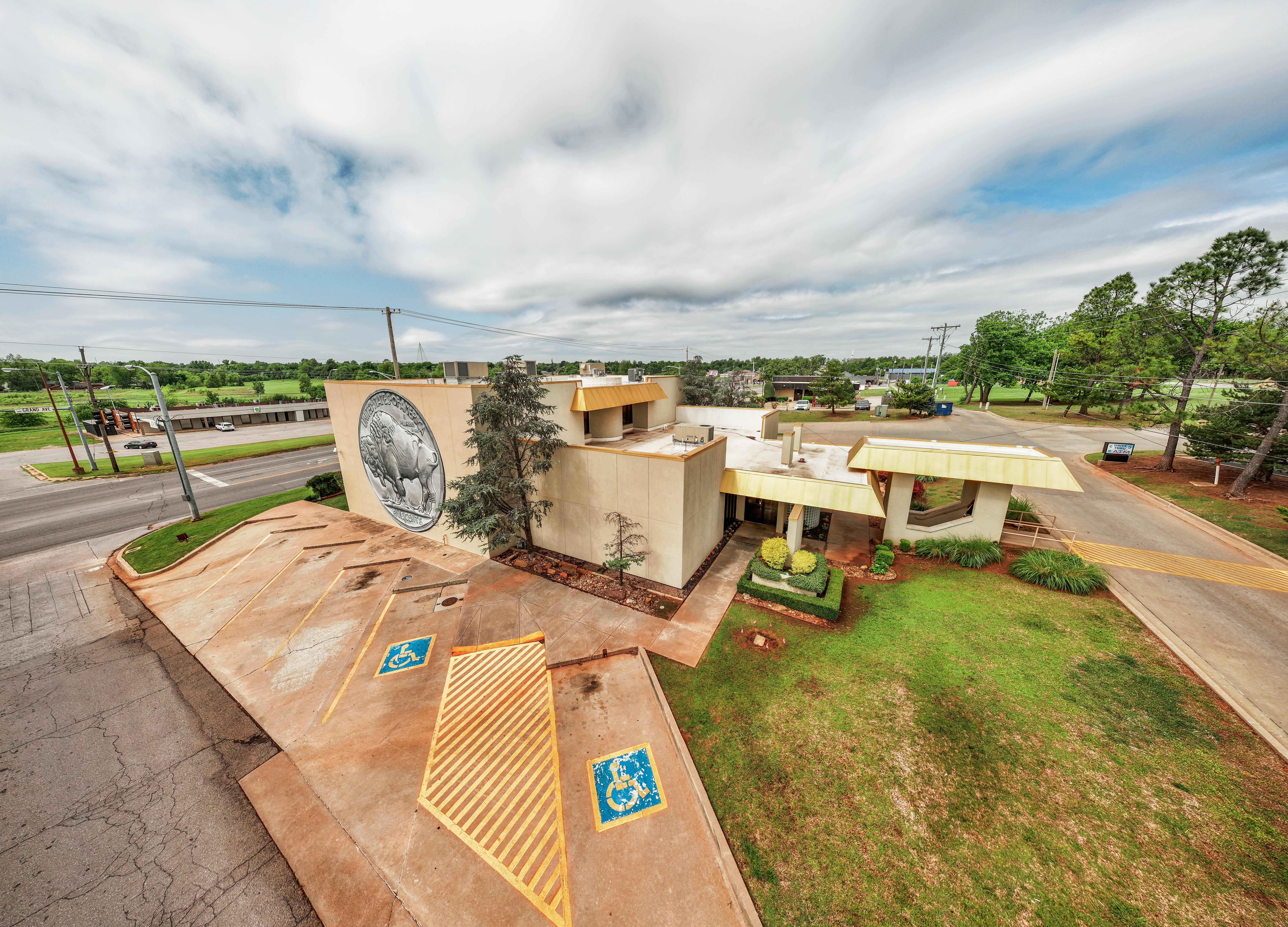 Aerial view of the Brooks Bank Chickasha Grand Avenue branch and its buffalo nickel medallion