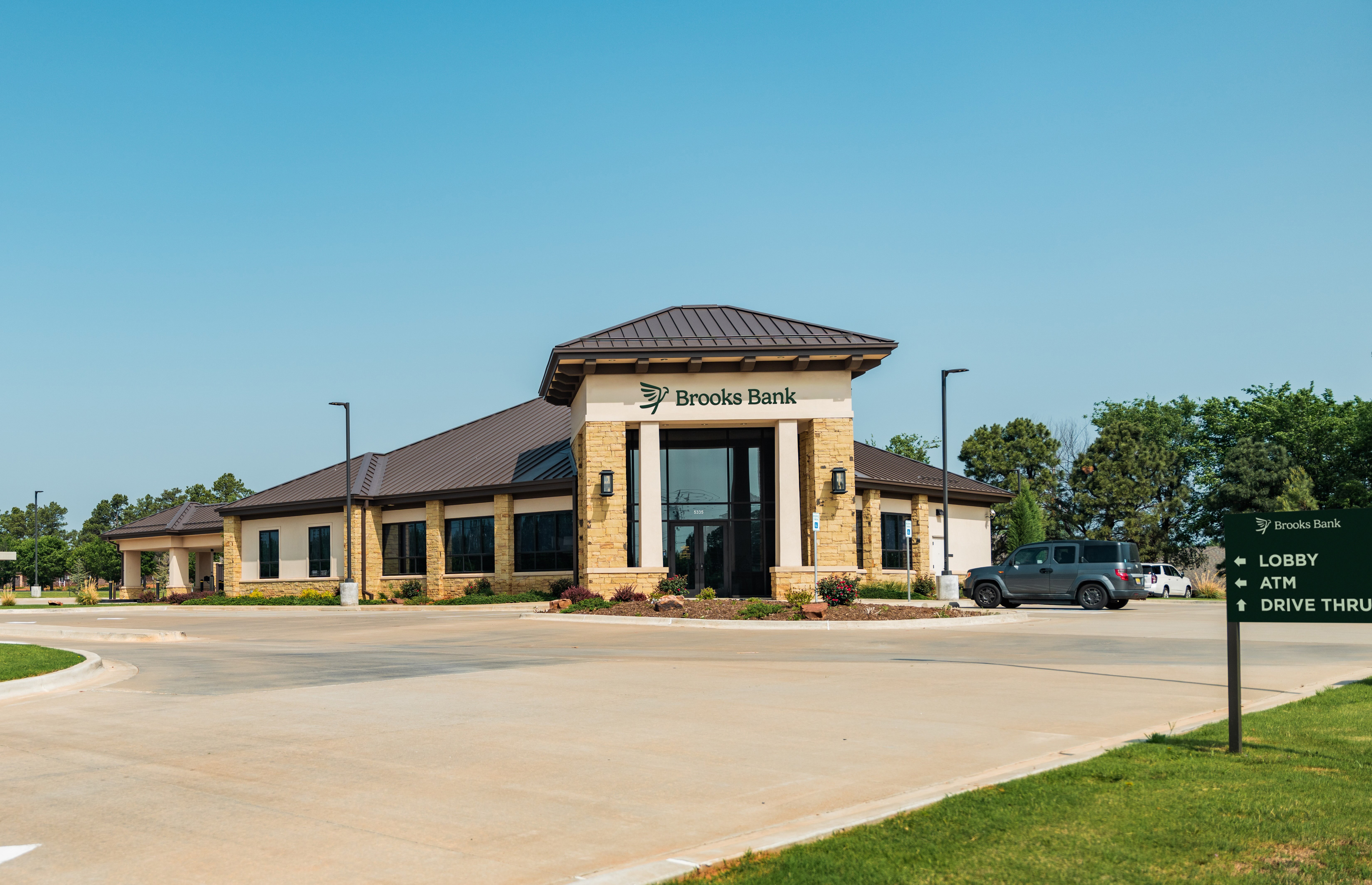 The Brooks Bank Tuttle branch with its lobby, ATM and drive-thru signage
