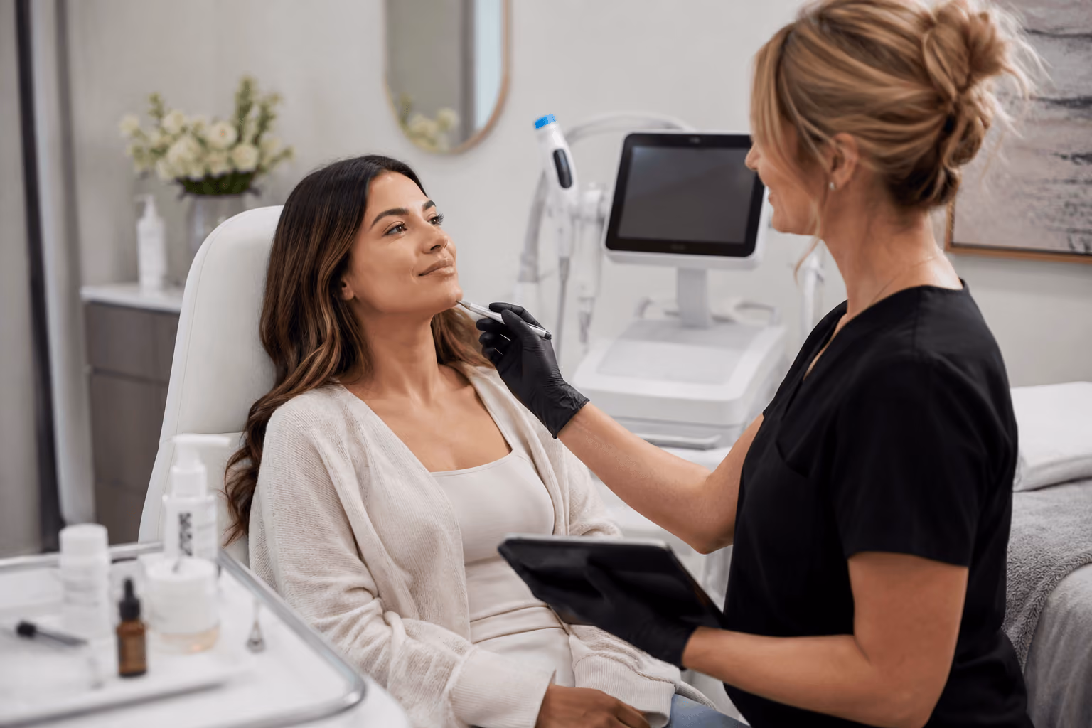 Patient receiving a personalized aesthetic consultation at a medspa in Greenwood, Colorado before Dysport, Hydrafacial, or laser hair removal treatment.