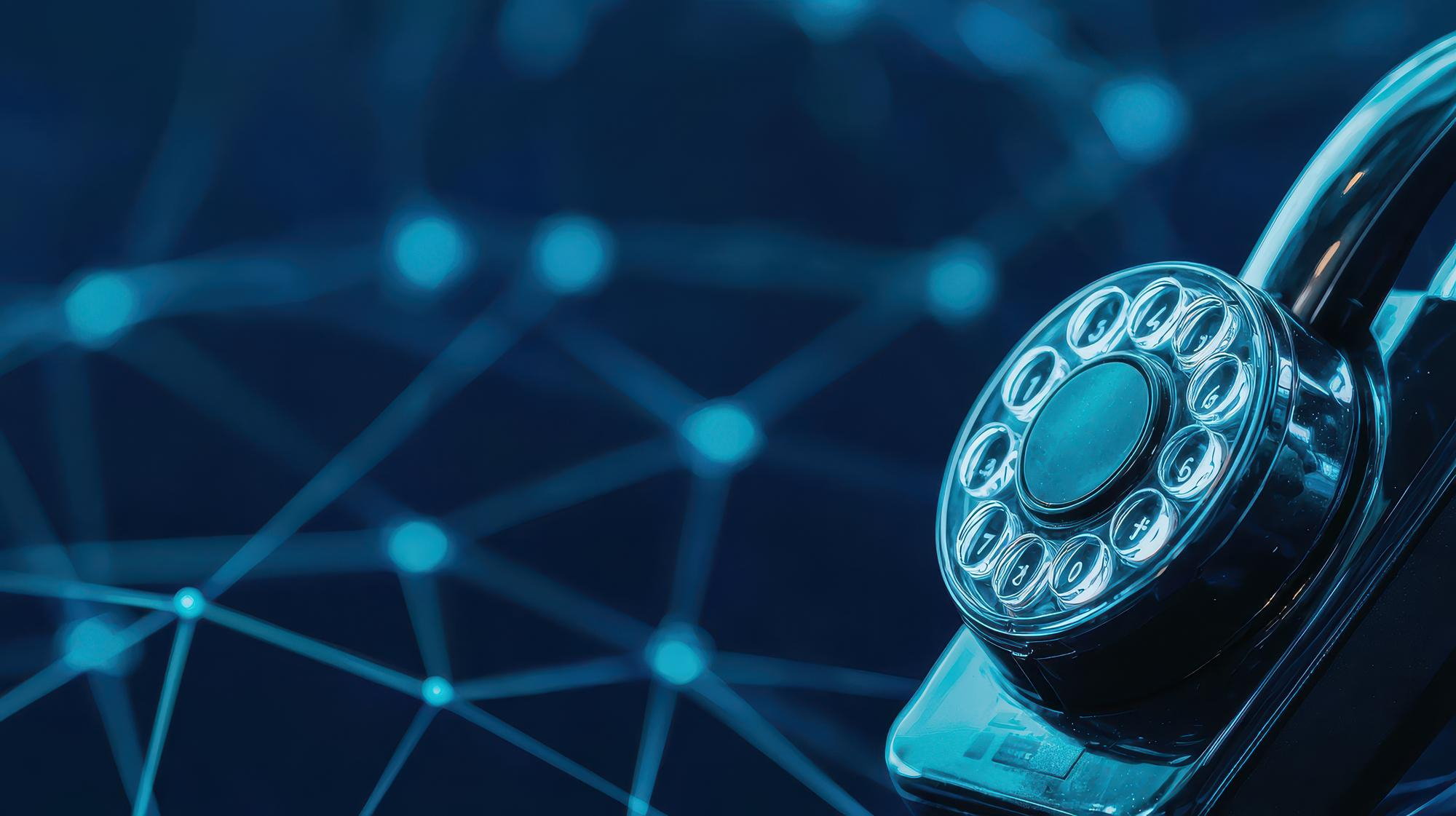Close-up of a vintage rotary dial telephone with a blurred blue digital network background.
