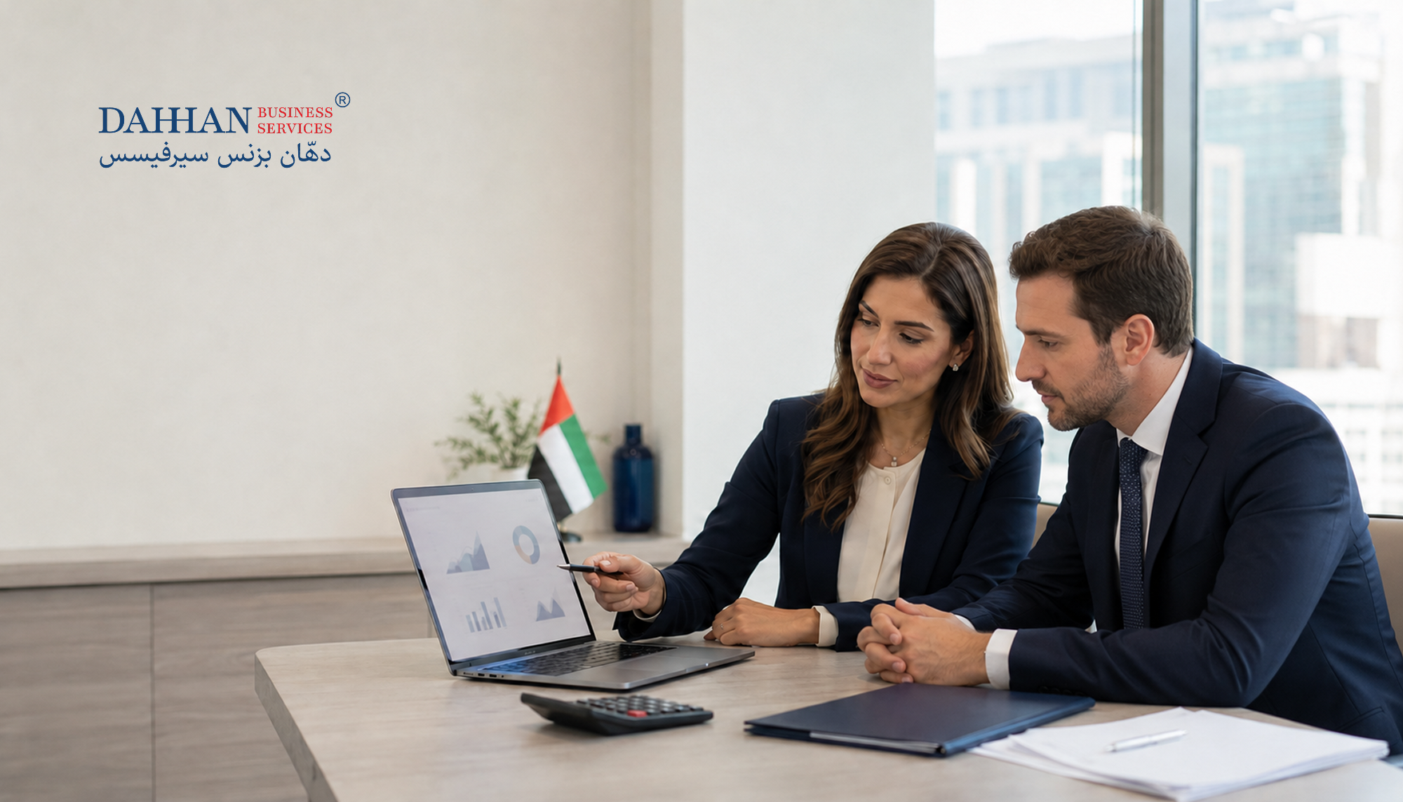 consultants discussing about VAT registration in the UAE