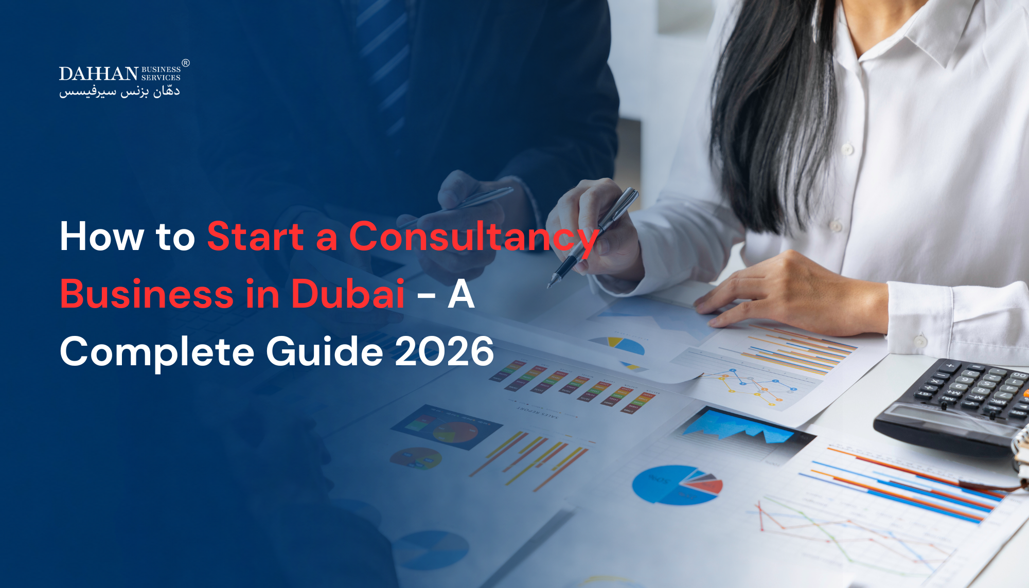 Businesswoman reviewing consultancy setup documents at a desk in Dubai