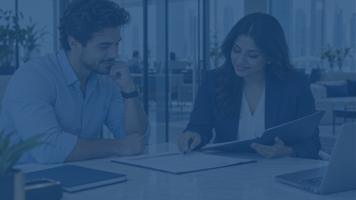 Business consultant reviewing freelance work permit application documents with a client.
