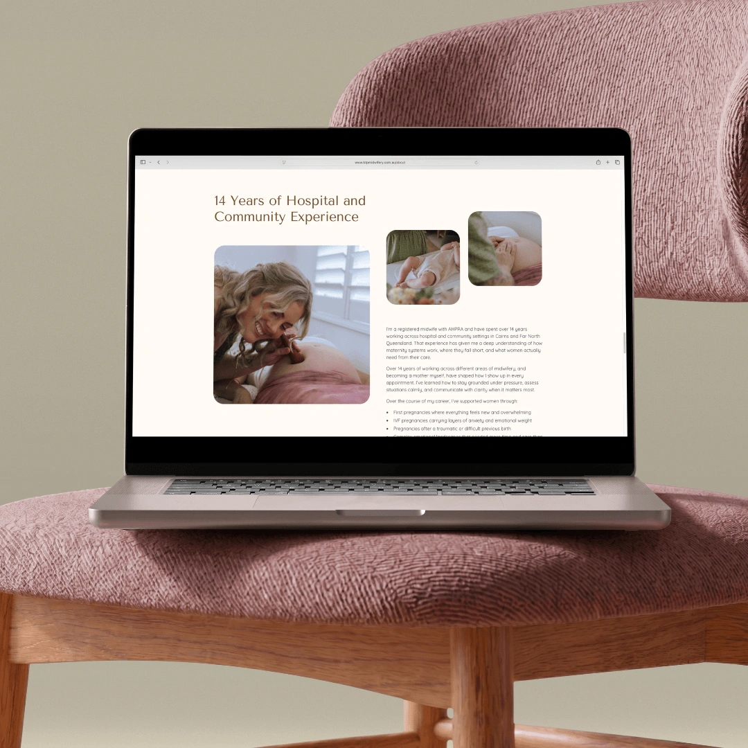 Laptop mockup on a pink upholstered chair displaying the "14 Years of Hospital and Community Experience" About page on the Beneath the Palms Midwifery website