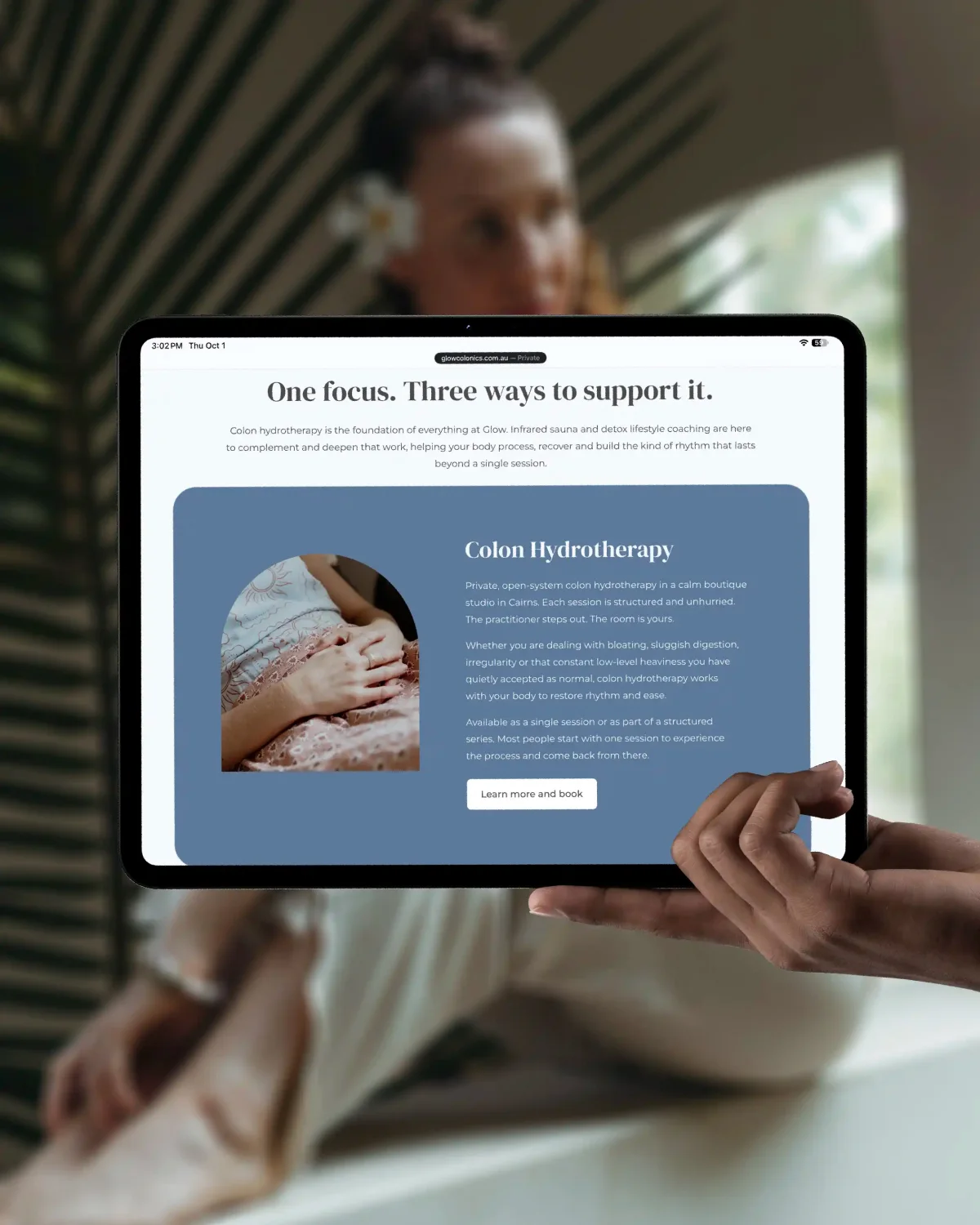 Tablet showing the Glow Colonics services section, 'One focus. Three ways to support it.' with colon hydrotherapy