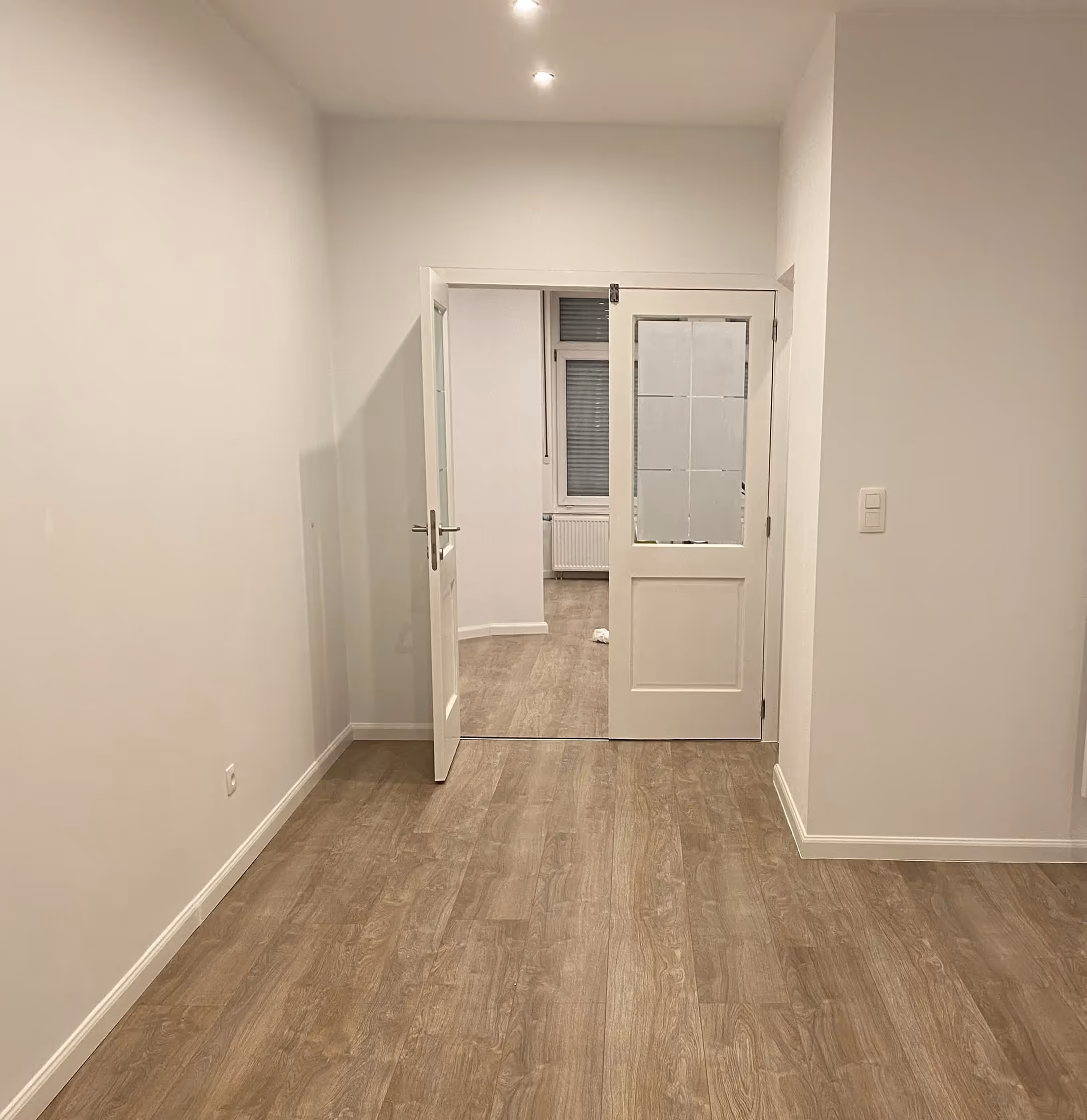 Rénovation intérieure d'un appartement, vu du salon. Réalisé par marasco group