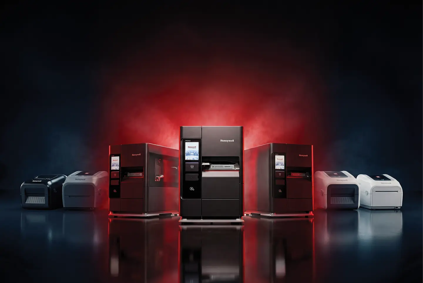 The Honeywell printer range, desktop through industrial models lit on a red backdrop