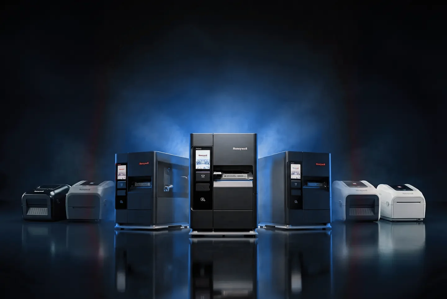 The Honeywell printer range, from desktop to industrial models, lined up in a dark studio
