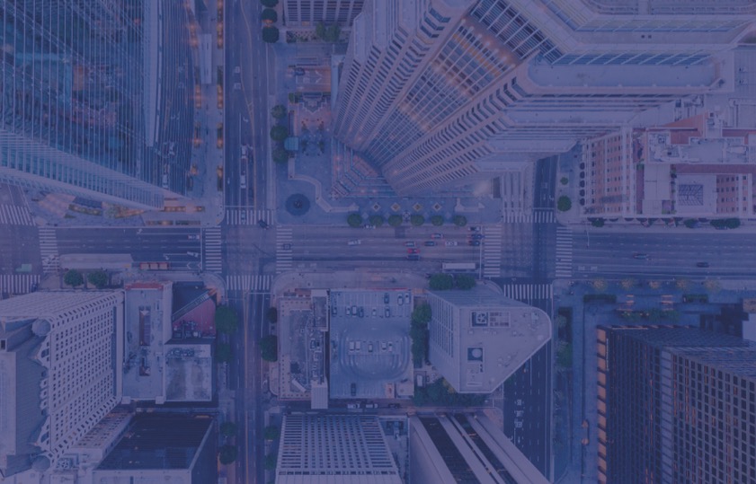 Aerial view of tall buildings at intersection