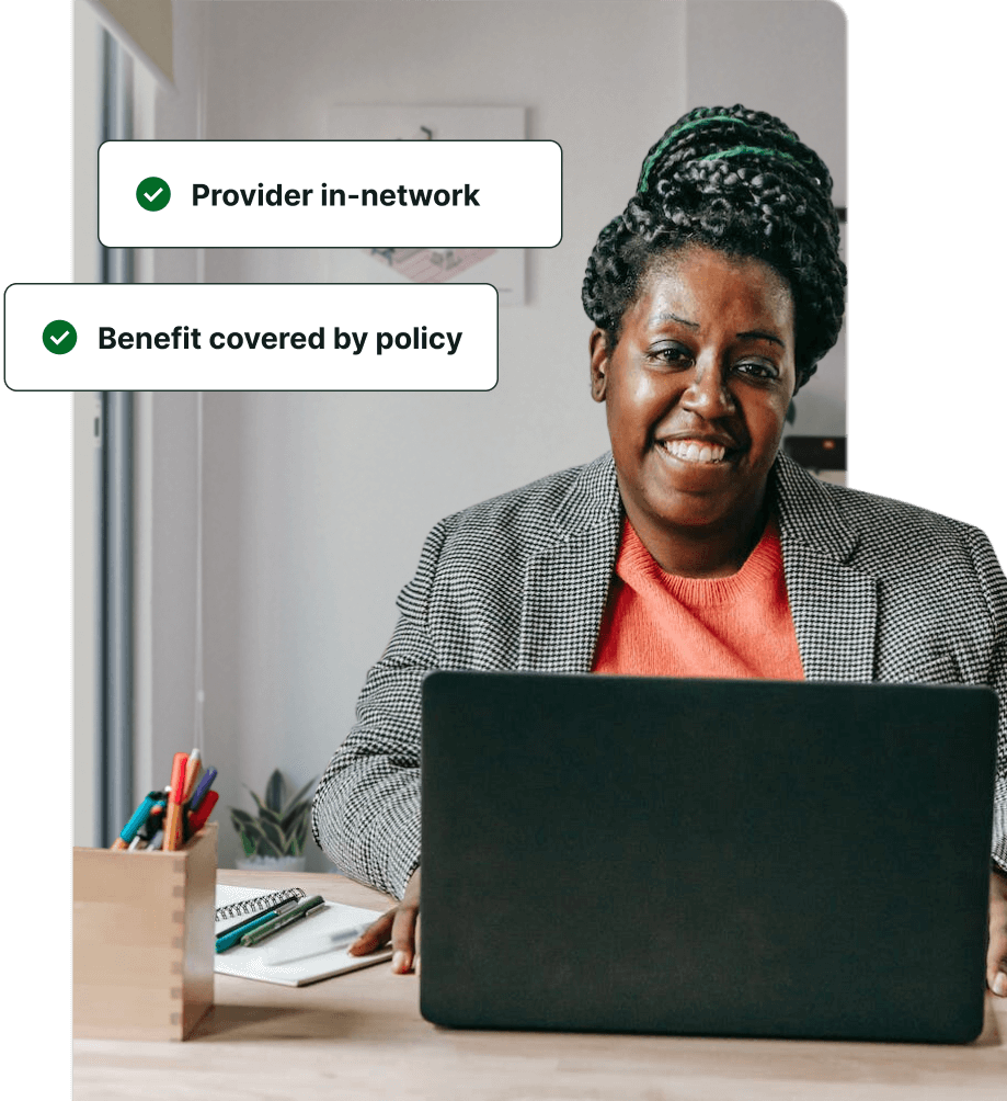 lady behind laptop checking things laughing