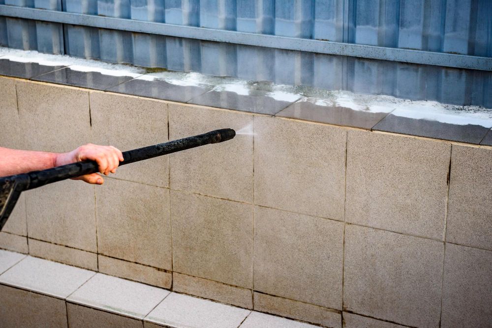 Exterior walls, paths, and hard surfaces