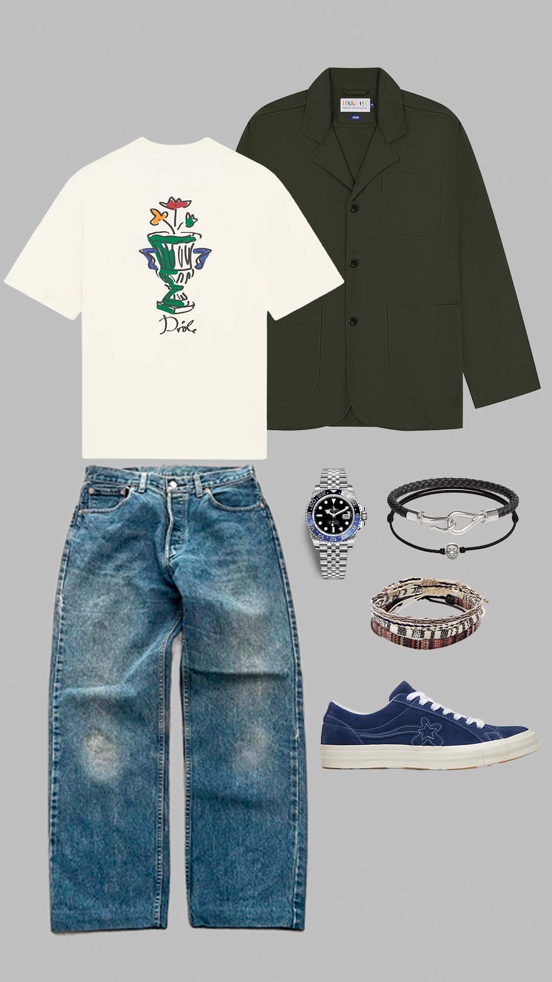 relaxed casual outfit for men with loose denim jeans graphic tee and green blazer