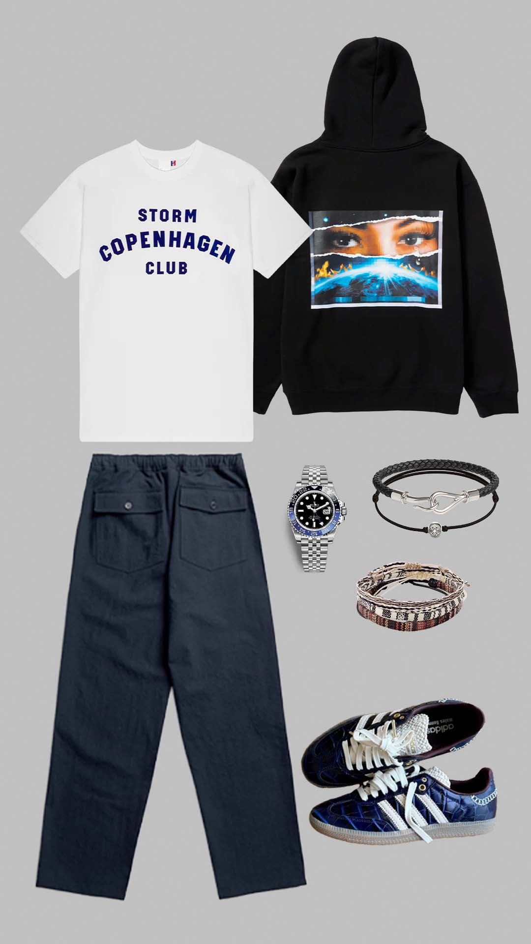 casual hoodie outfit for men with graphic hoodie relaxed navy trousers and sneakers