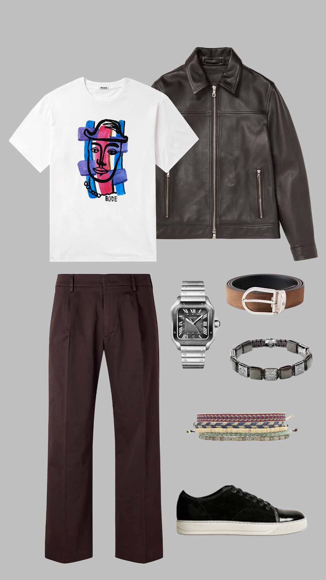 Old money outfit for men with graphic white t-shirt, brown leather jacket, brown trousers and black sneakers