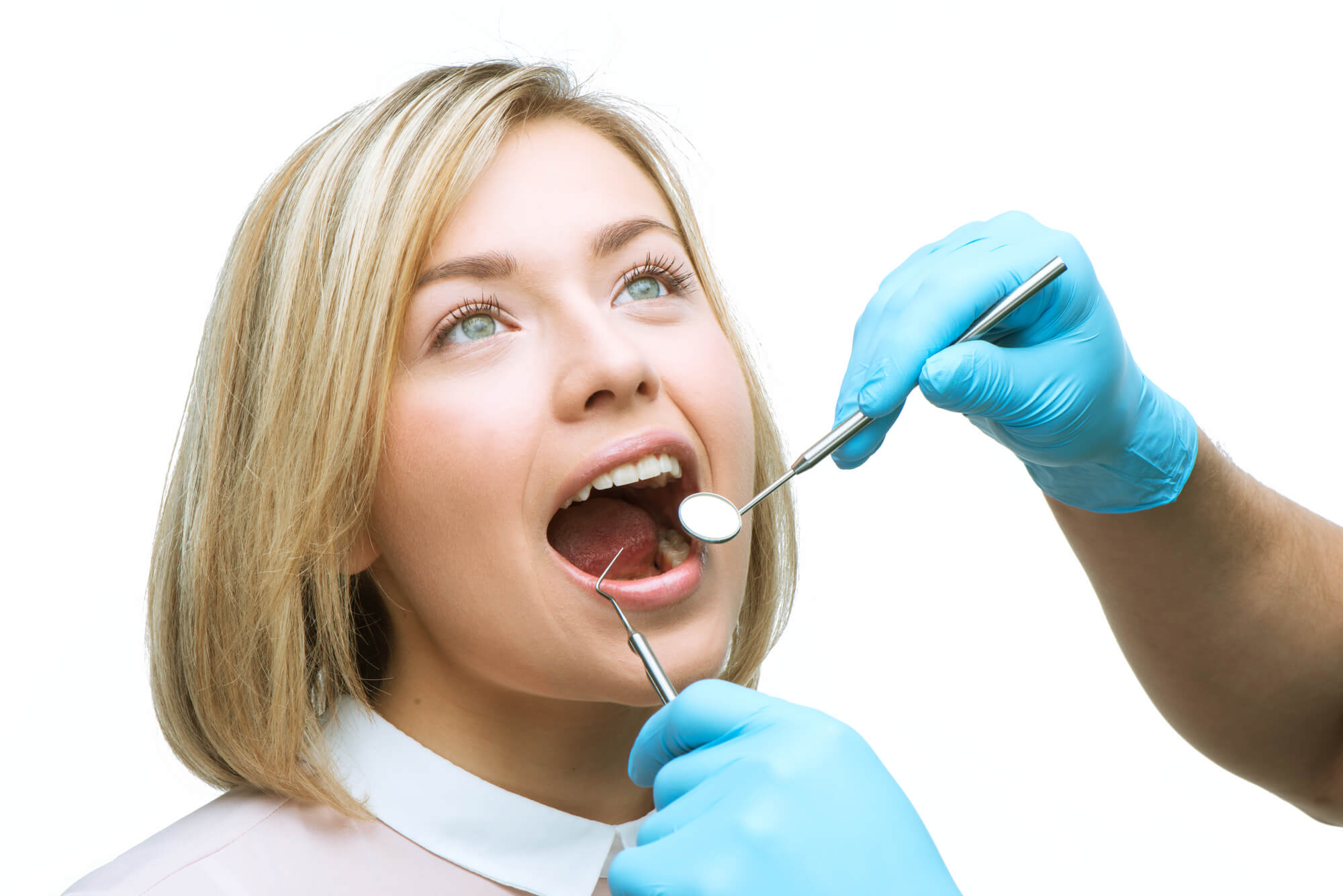 dentist checking patient's new teeth in a day in orlando  