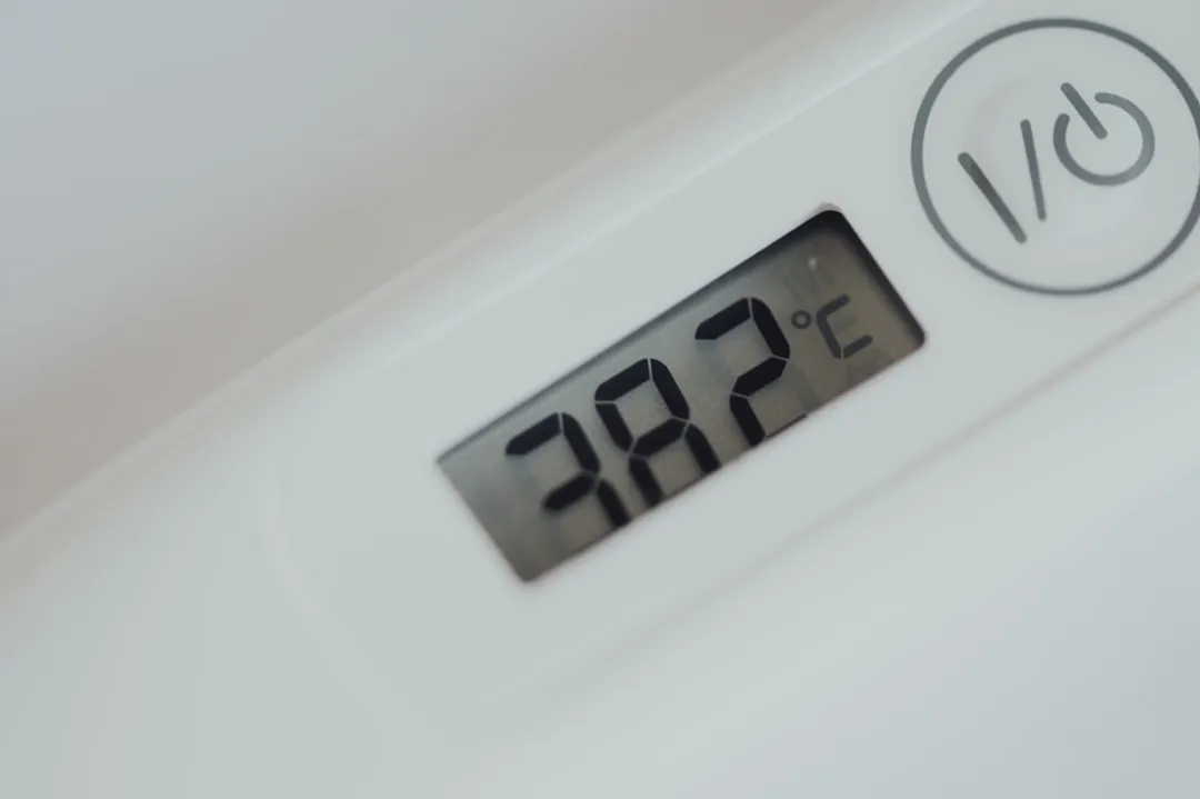 A home thermostat displaying an error code or a low temperature - residential heating repair raytown mo