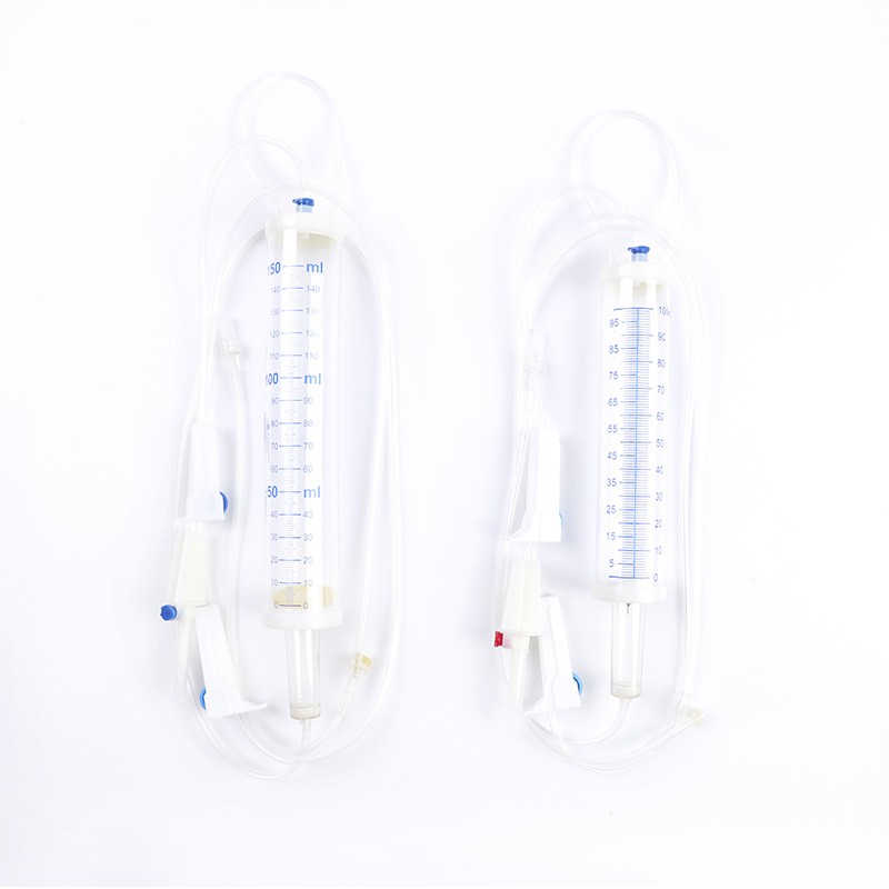 Two IV infusion sets, medical equipment for delivering fluids or medication intravenously.