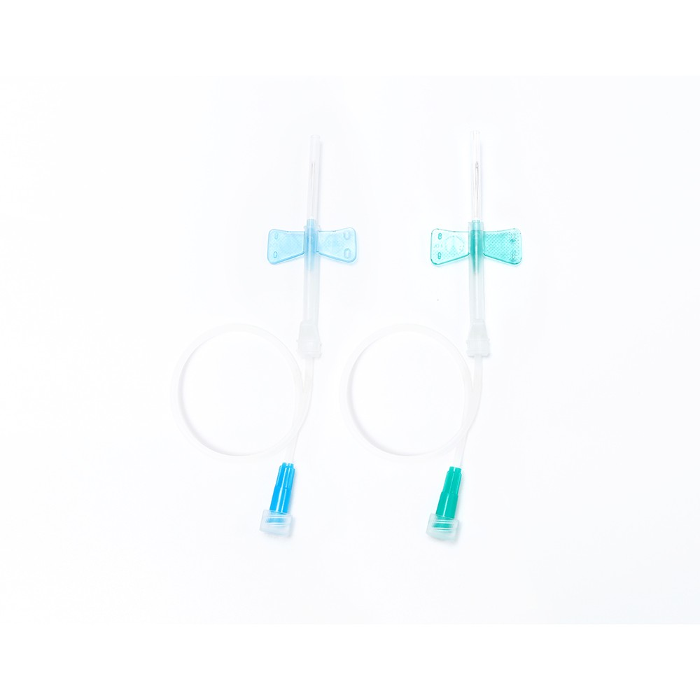 Two IV catheter sets, complete with needles, tubes, and butterfly wings for insertion. Medical supplies.