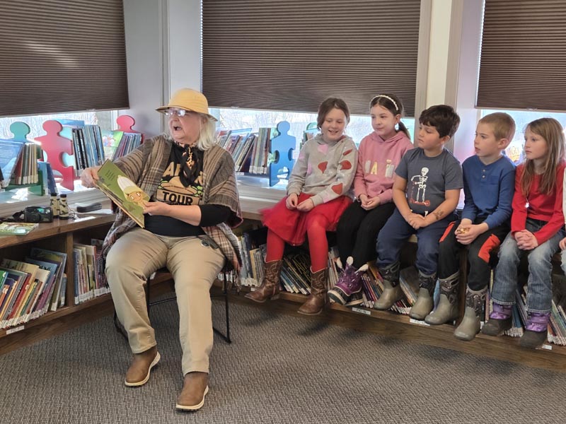 Marlene Clark reads to children at the Meadows Valley Public Library on February 11.Photo credit: Rachel Reynaga.