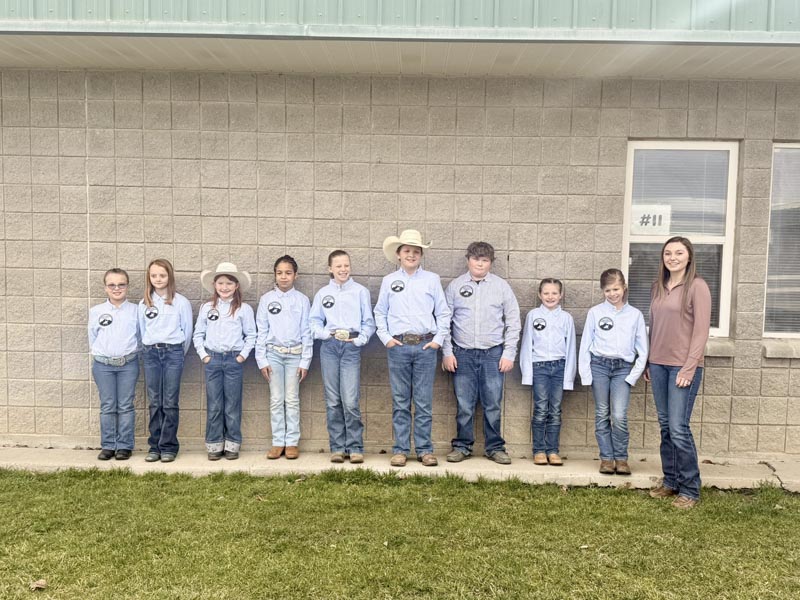 The Cuddy Mountain Riders 4-H Club with their leader and coach, Mesa Ivey. Photo credit: Adams County 4-H.