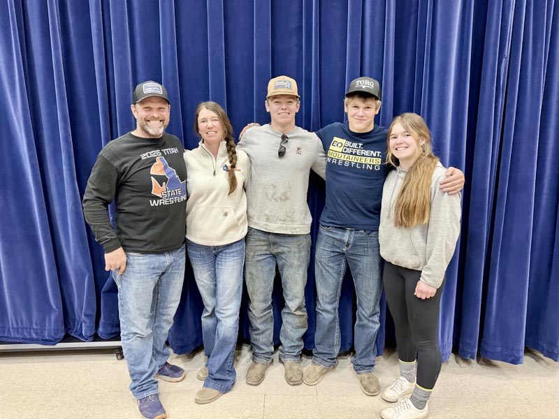 Eli Noah pictured with his family. Photo credit: Titan Wrestling.