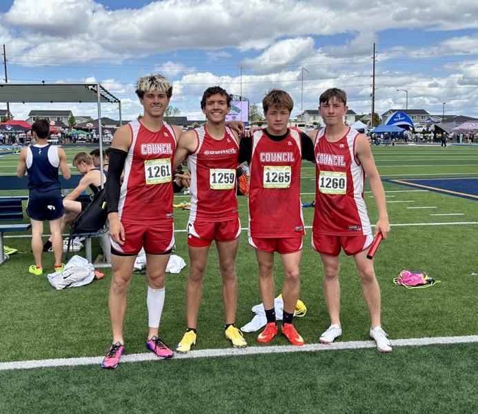 4x200 relay team L-R: Owen Hatfield, Greer Green, Jim Tucker, and Rowan Green.	Photo credit: Lumberjack Sports