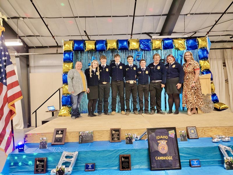 2026-2027 Chapter Officers: L to R: Ms. Reese, MacKee Nichols (President), Kellan Moura (Reporter), Ridge Loveland (Treasurer), Eric Loveland (Sentinel), Jack Papineau (Secretary), Easton Hastie & Madalyn Reynolds (co-Vice Presidents), Mrs. Nichols. Photo credit: Cambridge FFA.
