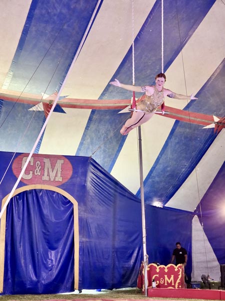 A performer with Culpepper & Merriweather Circus flies high in New Meadows over the weekend.Photo credit: Rachel Reynaga.