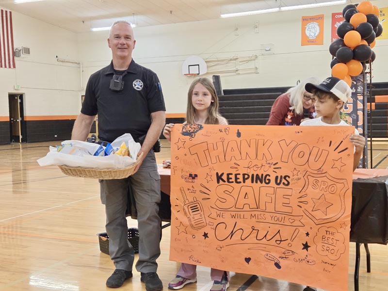 Adams County Deputy and School Resource Officer, Chris Carlisle at his send-off.Photo credit: Rachel Reynaga.