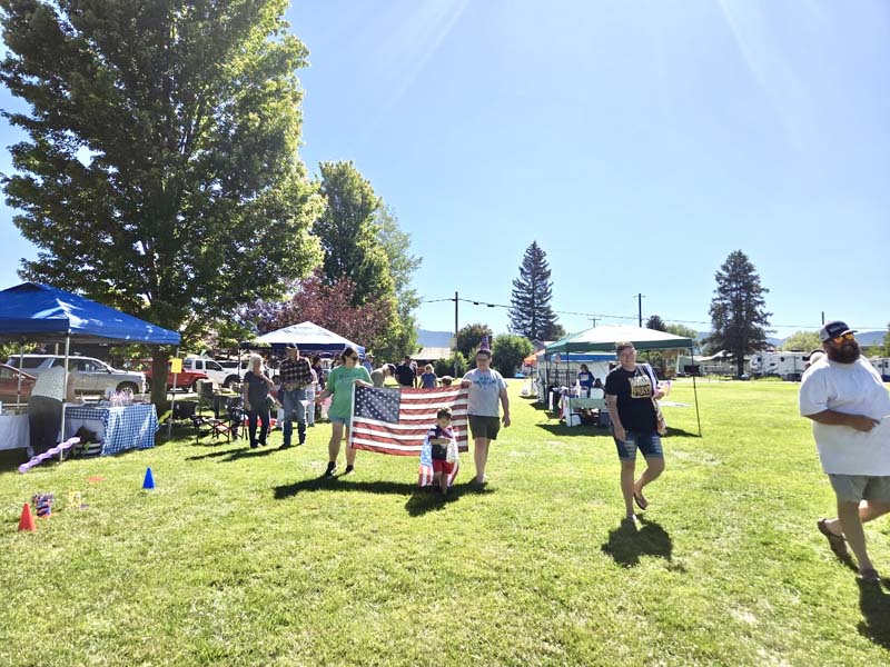 A kids parade was part of the festivities on the 4th in new Meadows. Photo credit: Rachel Reynaga.