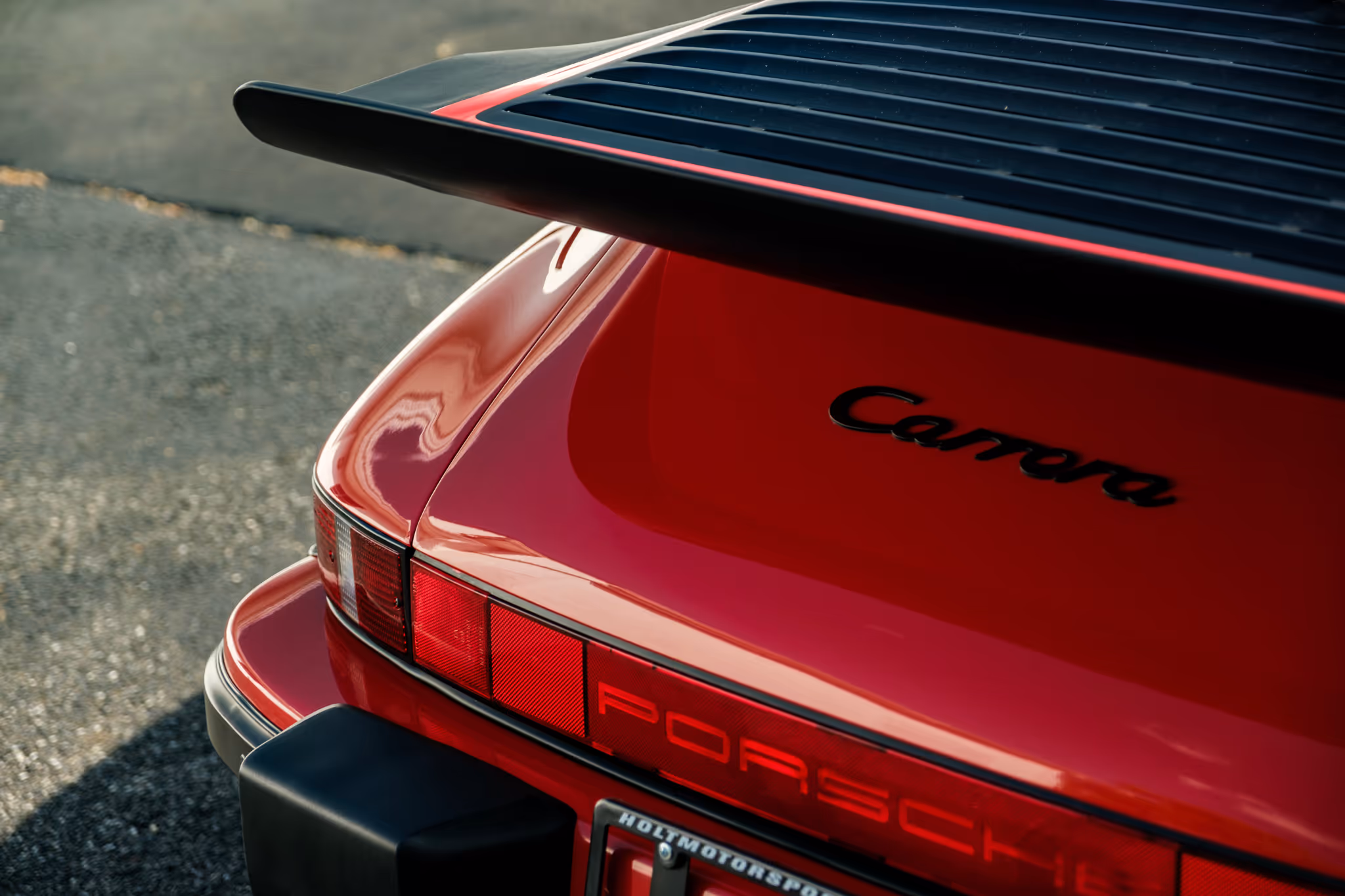 Rear 3 / 4 shot of a 1988 Porsche 911 Coupe at Holt Motorsports