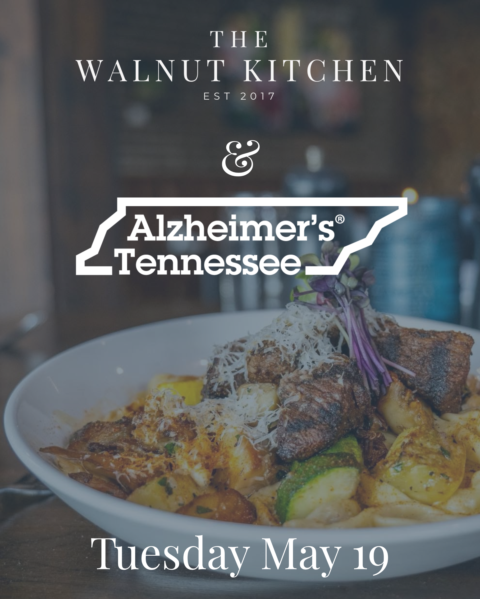 Plate with a pulled chicken sandwich on toasted bread and a side of crispy seasoned fries on a wooden table with blurred warm lights in the background.