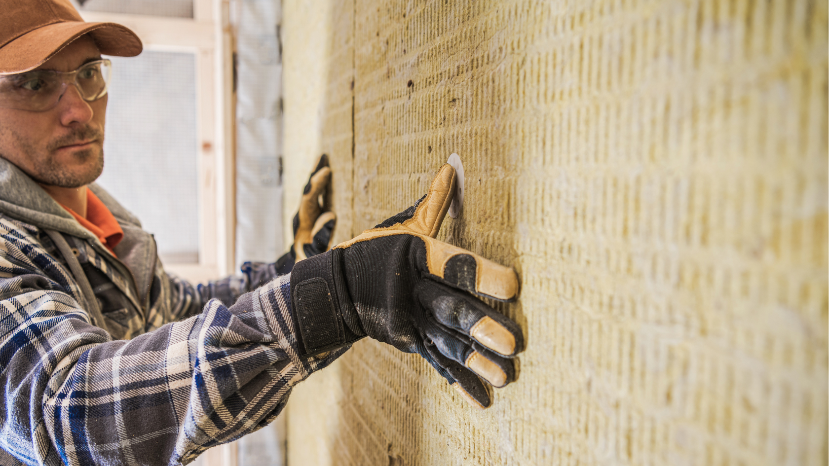 Curved white concrete architecture against a clear blue sky, showcasing smooth lines and modern design elements.