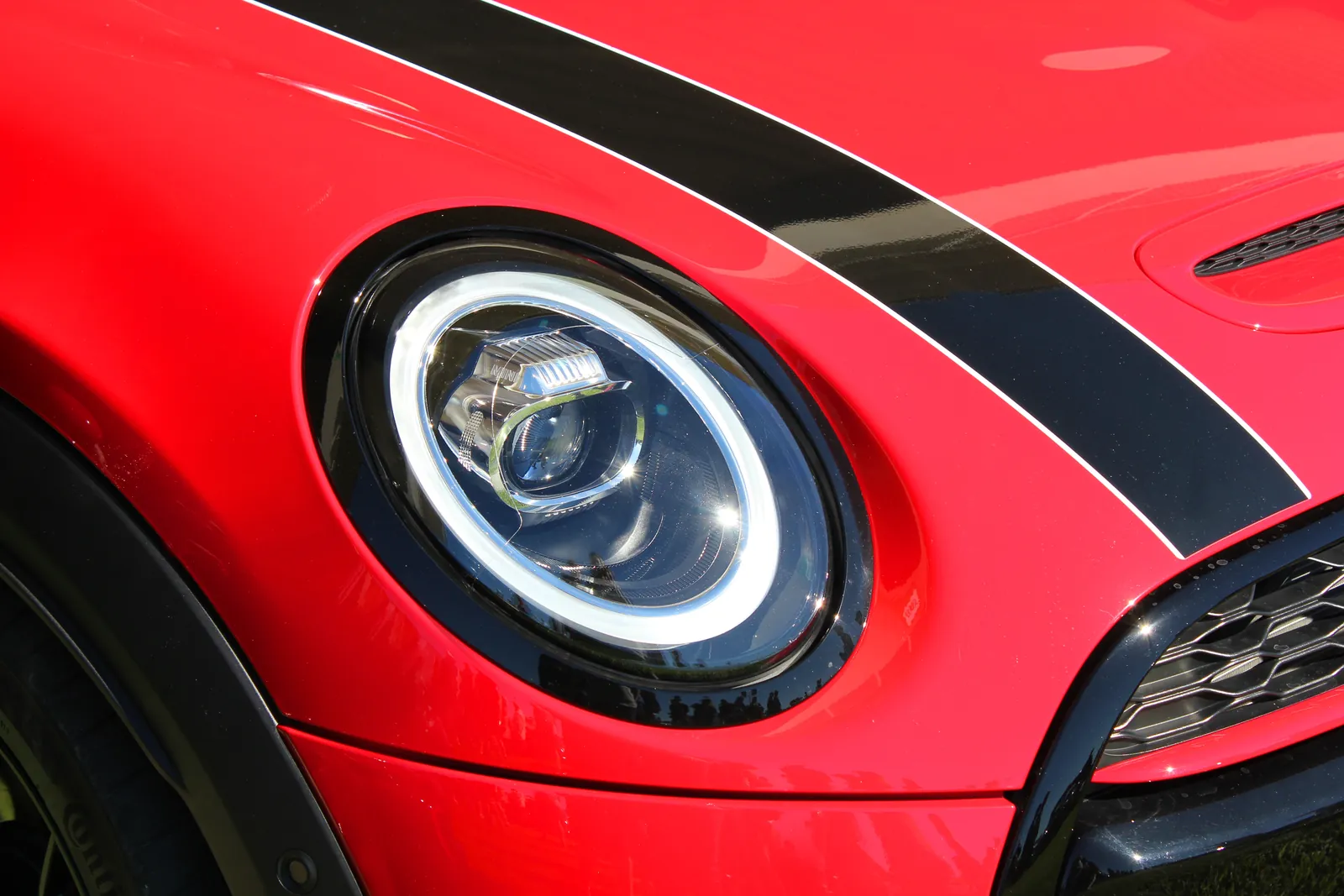 Red MINI Cooper headlight and hood stripes
