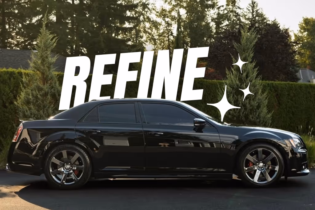 Shiny black sedan parked outside with word 'REFINE' and sparkle graphics above it.