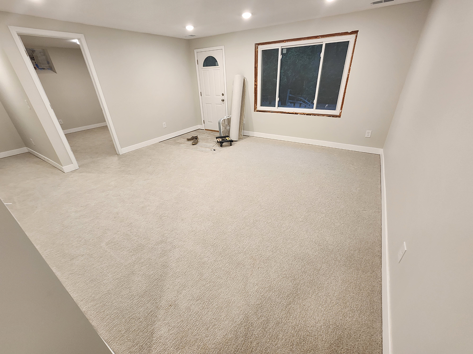 Finished basement remodel with egress window in a Twin Cities home