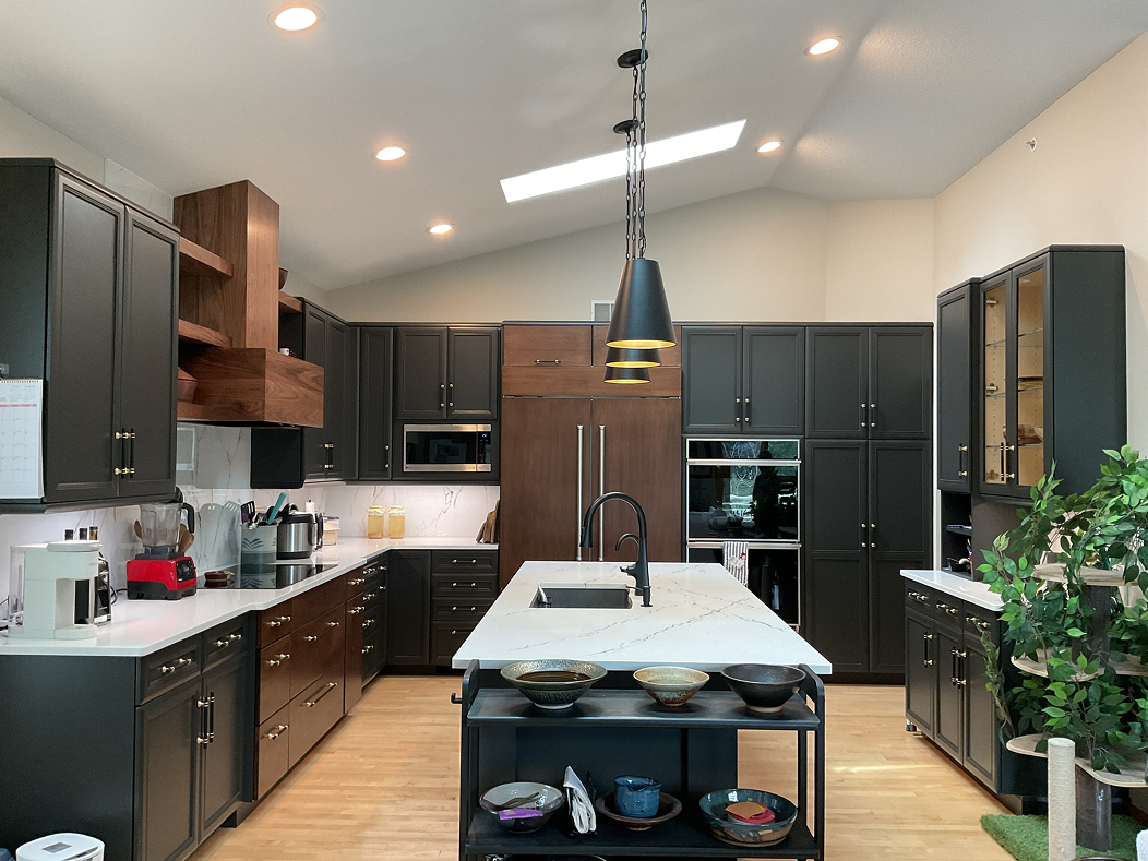 Completed kitchen remodel by Executive Remodeling in the Twin Cities featuring custom cabinetry and a large island